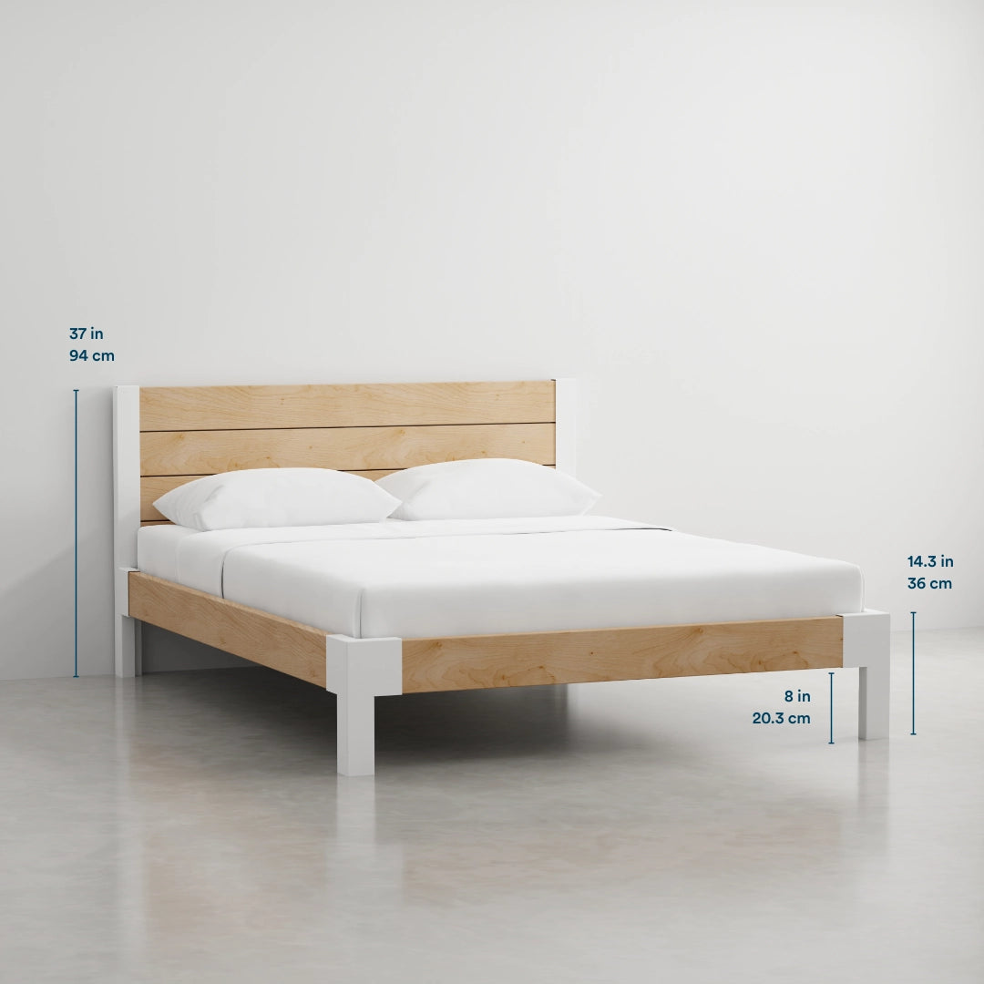 Build&Bond DIY platform Wooden bed with white mattress and pillows on a plain background